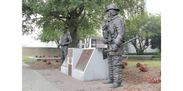 Memorial to Fallen Police Officers and Firefighters  Bronze and stone Figures by Neil Brodin Site: City Hall, 2400 Washington Avenue